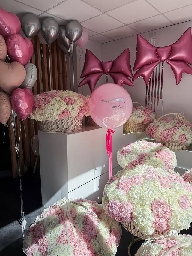 Elaborate balloon and flower arrangement for a special celebration