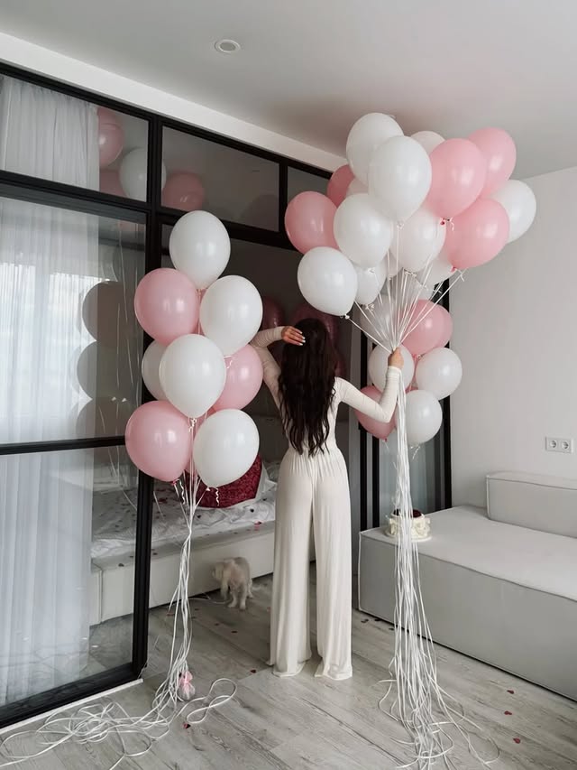 Pink and white balloon clouds delivered as a romantic surprise